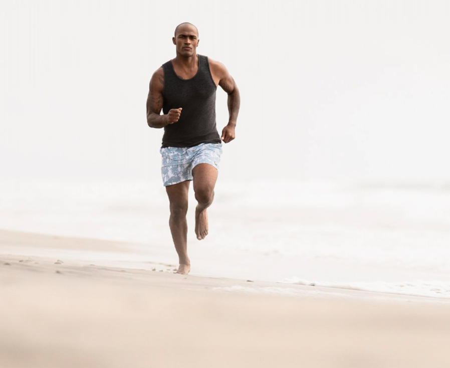 Men running wearing Vuori's clothes